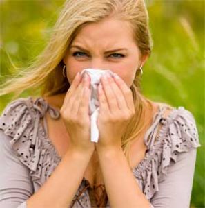 Woman with Allergies Sneezing